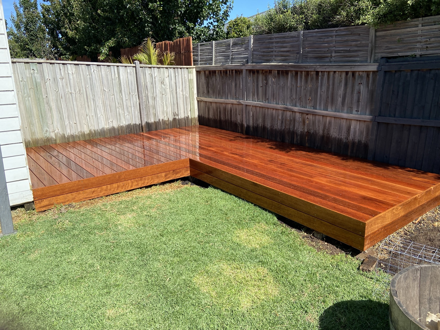 Hardwood timber deck built along fence line